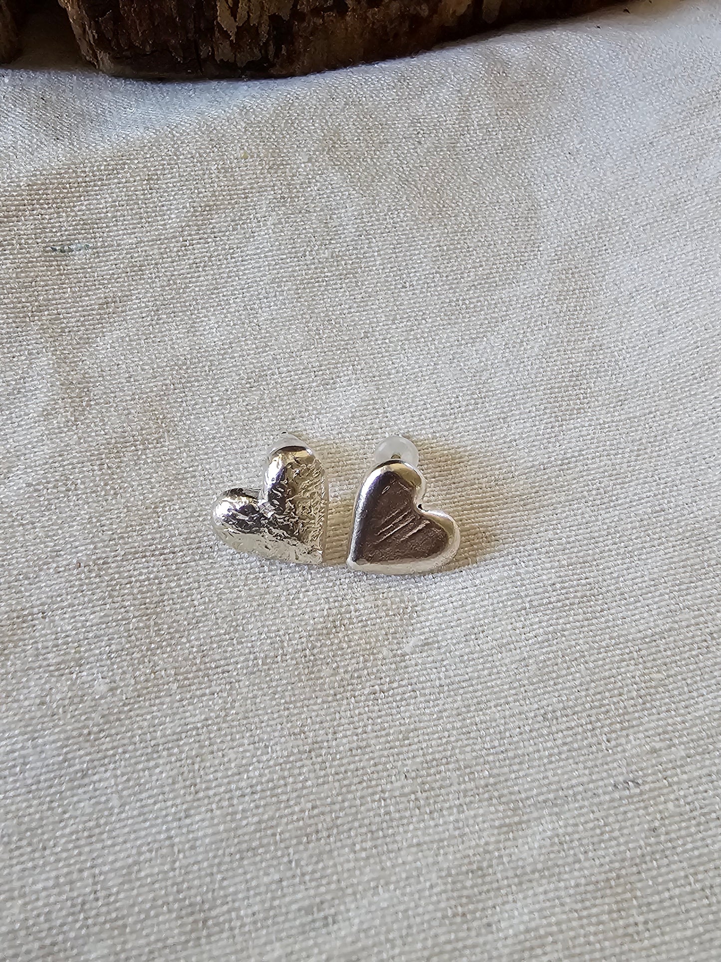 Asymmetrical stud heart earrings Silver