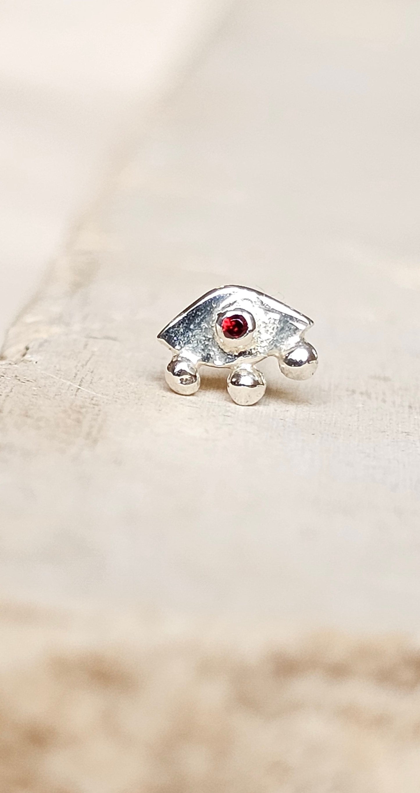 Tiny Garnet Eye Stud Silver