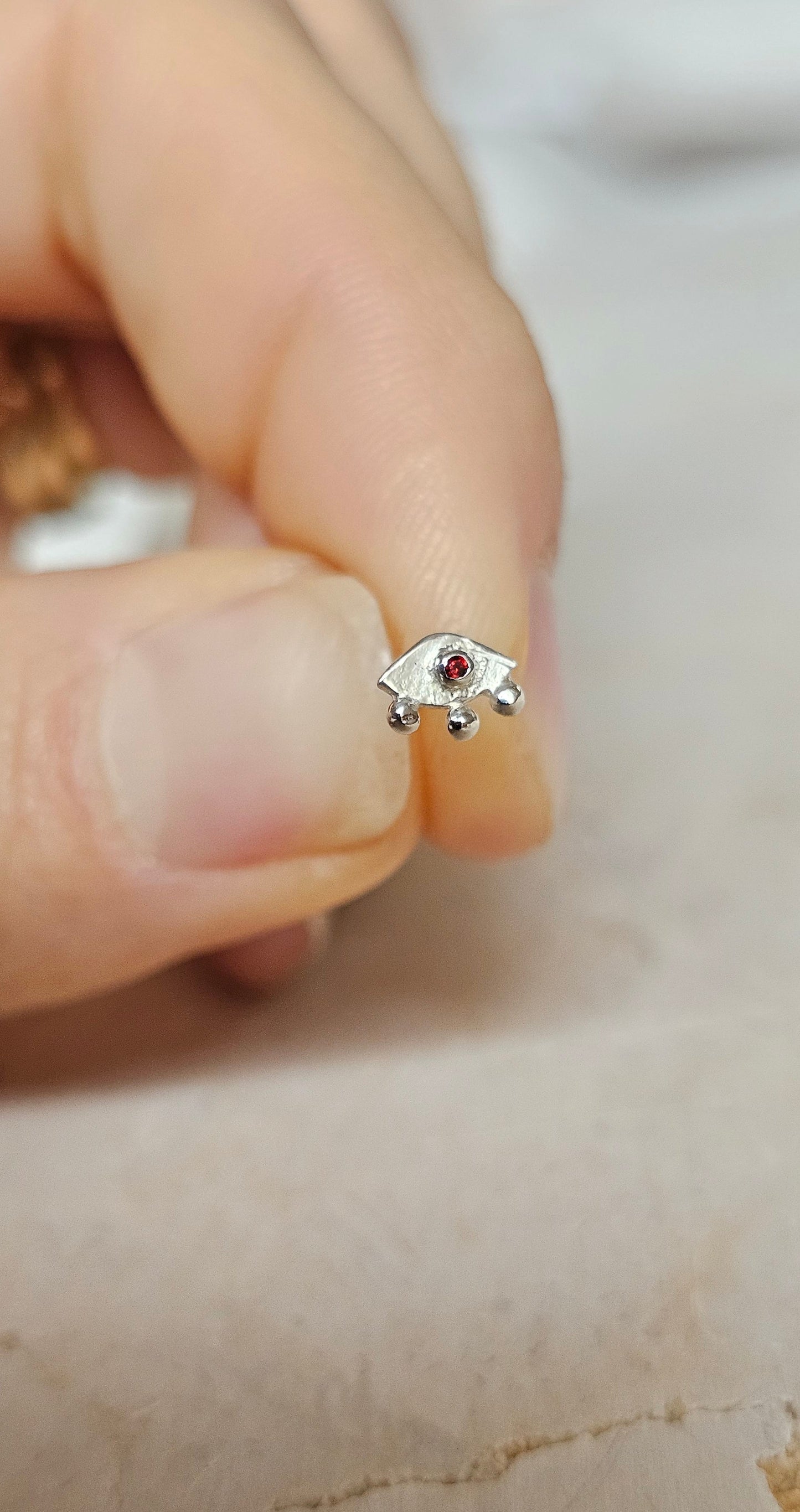 Tiny Garnet Eye Stud Silver