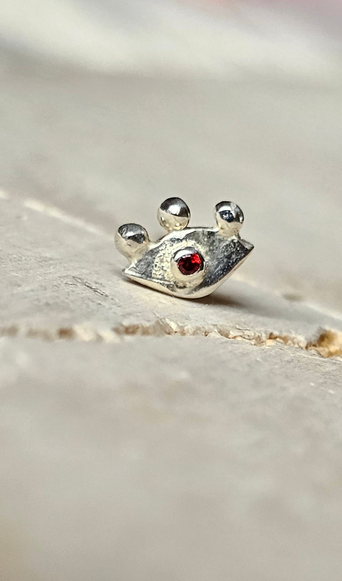 Tiny Garnet Eye Stud Silver